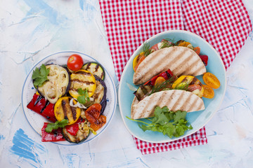 tortilla with vegetables and salmon. Fitness food. Healthy lunch. Vegetables and fish. Summer menu