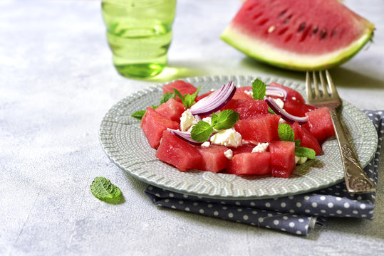 Watermelon salad with feta and red onion.Top view with space for text.