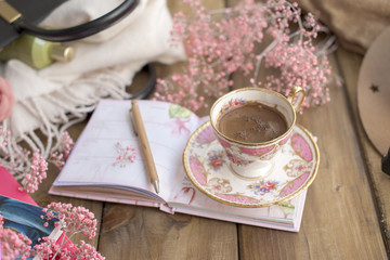 Vintage photo, fragrant coffee and women's accessories. Good morning at the cafe. Planning. Text