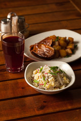  lunch with grilled fish with potatoes, salad and beer