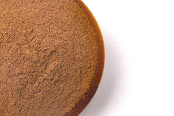 Ground Cinnamon on a White Background