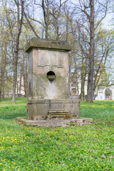 Old water fountain in Czartoryski Palace in Pulawy, Poland.