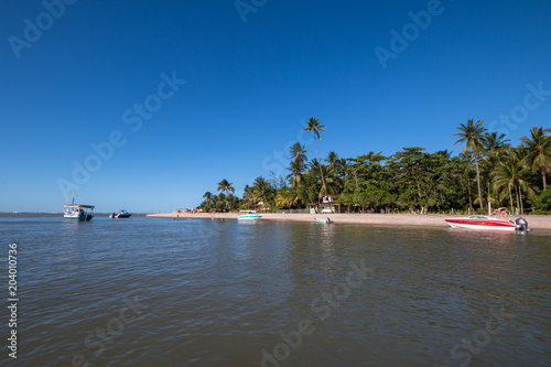 Tropical Island With Fishing Boat In The Sea Tropical Island With Fishing Boat In The Sea