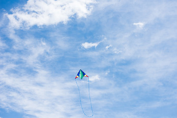 Fototapeta na wymiar low angle view of kite with cloudy sky on background