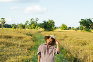 Brown Skin Farmer And His Rice Field 