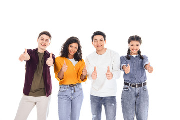 Obraz premium portrait of multiracial teen friends showing thumbs up isolated on white