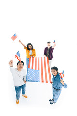 Fototapeta premium high angle view of group of multiethnic teens with usa flags isolated on white