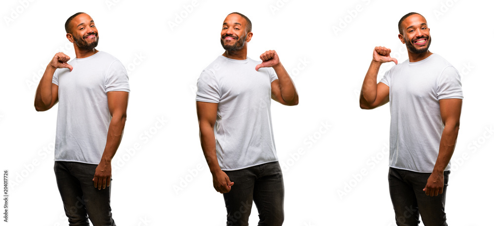 Poster African american man with beard proud, excited and arrogant, pointing with victory face