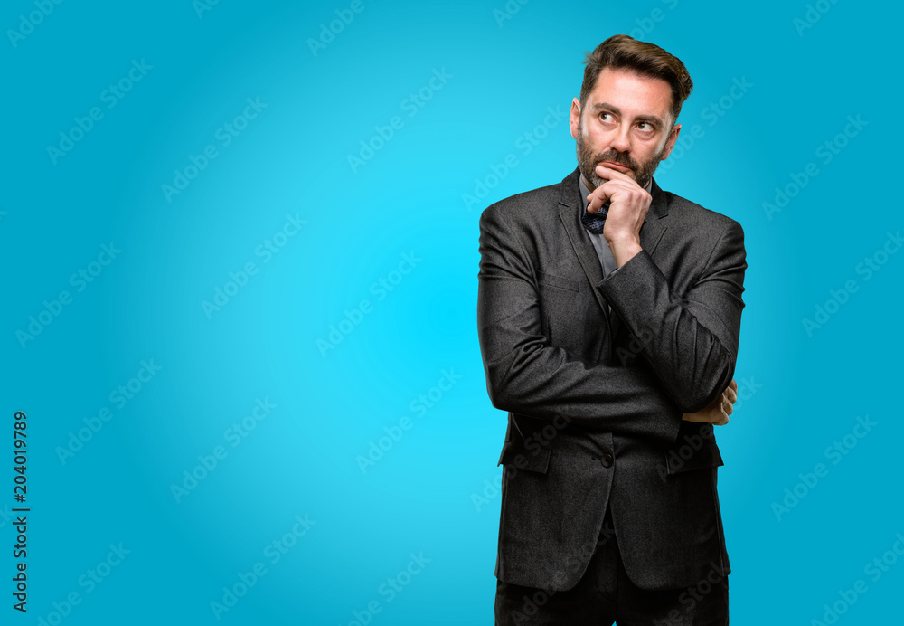 Canvas Prints Middle age man, with beard and bow tie doubt expression, confuse and wonder concept, uncertain future