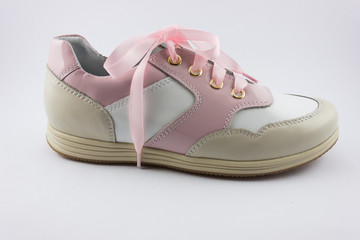 Color sport shoes for kids isolated on white background