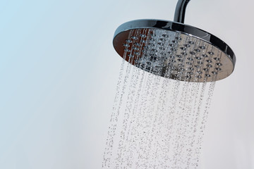 Close up of Water flowing from shower in the bathroom - obrazy, fototapety, plakaty