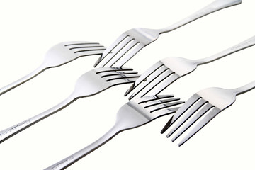 Fork / A fork, in cutlery or kitchenware, is a tool consisting of a handle with several narrow tines on one end. 