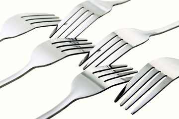 Fork / A fork, in cutlery or kitchenware, is a tool consisting of a handle with several narrow tines on one end. 
