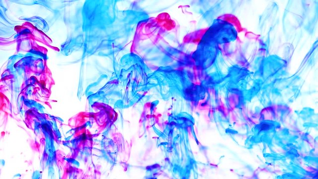 Color drop underwater creating a silk drapery. Ink swirling underwater