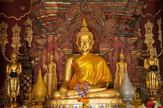 gold image buddha in the old temple Ayutthaya, Thailand 