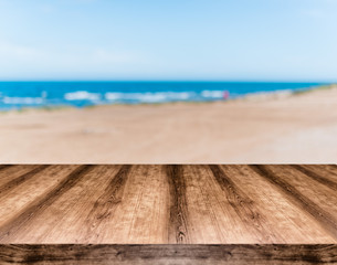 Wooden empty table board in front of blurred background. Can be used for display or montage any product. Mock up for display your product.