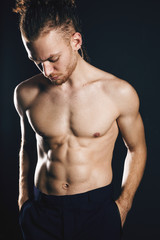Fototapeta na wymiar Young ginger topless man studio portrait