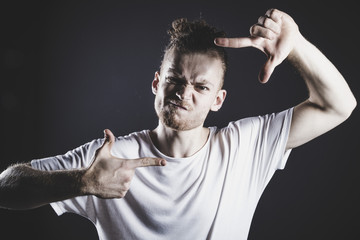 Young ginger man studio portrait