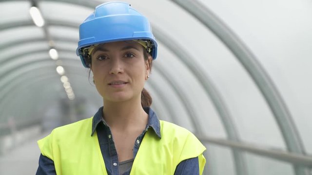 Portrait of industrial engineer with security hat and lifevest