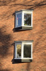 Brick wall with four windows in Stockholm, Sweden
