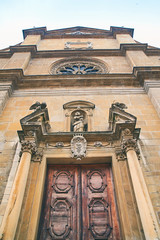 Entrance of Chiesa Collegiata dei SS Pietro e Stefano church in Bellinzona, Ticino, Switzerland