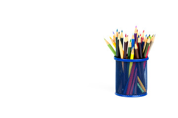 Color pencils in a pencil box on white background