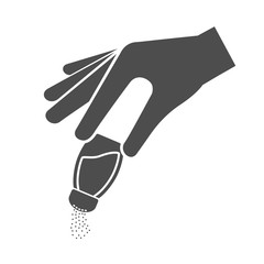 Hand holding glass salt shaker with falling salt icon concept - obrazy, fototapety, plakaty