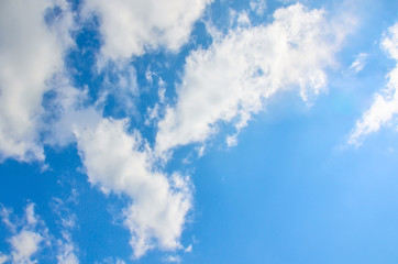 Obraz premium Blue sky with white summer cumulus clouds.