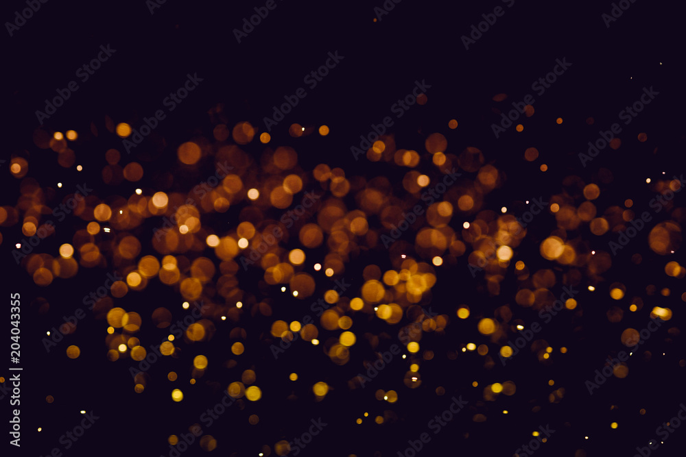 Wall mural Christmas blur bokeh background texture abstract light glittering stars on bokeh. glitter vintage lights background