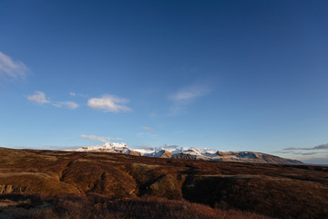 Volcanic landscape with mountains near glacier, South Iceland