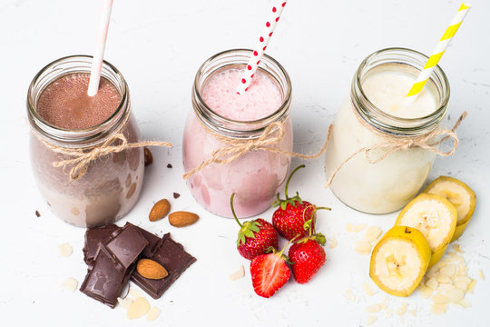 Banana chocolate and strawberry milkshakes