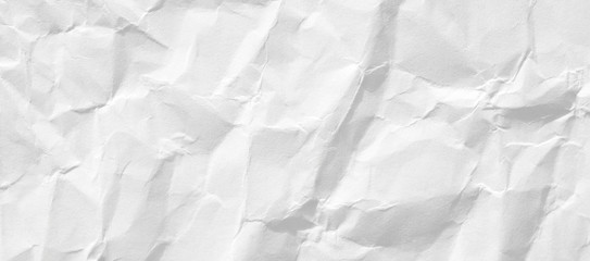 The background is white. Texture of paper with kinks and dents, old and dilapidated.