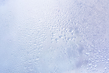 Water drops in the glass surface