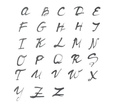 The alphabet written on white paper