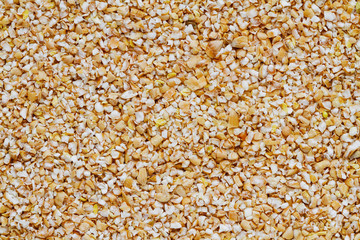 Background from wheat groats. Closeup