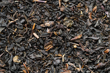 Background from black tea. Closeup