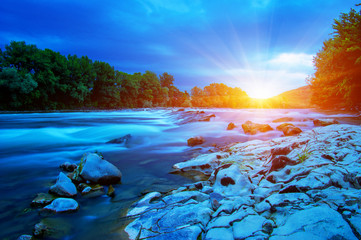 Fototapeta na wymiar River water and sunset