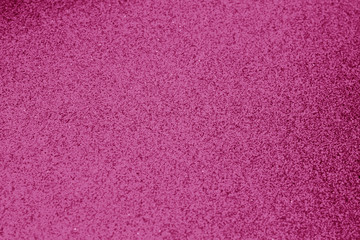 Fototapeta premium Glittering background with blur effect in pink color.