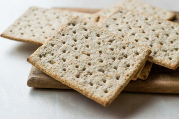 Stack of Honey Flavored Graham Crackers on Wooden Surface.