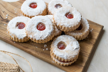 Jam Filled Round Linzer Cookies with Powder Sugar