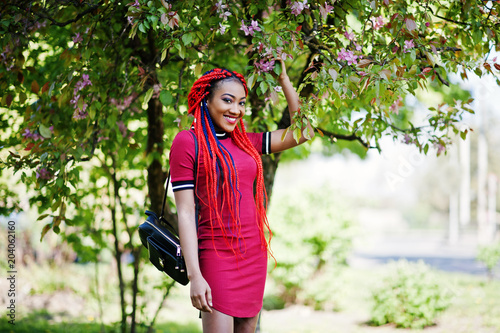 Cute And Slim African American Girl In Red Dress With