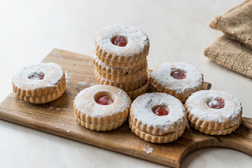 Jam Filled Round Linzer Cookies with Powder Sugar
