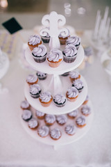 Obraz na płótnie Canvas Сandy bar on wedding banquet. Delicious desserts and cake.