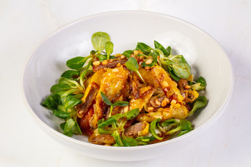 Duck tempura with salad