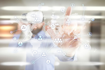 Social network and global recruitment, outsourcing and HR. Virtual screen with world map and peoples icons.