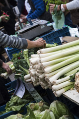Farmer sells leek on the market