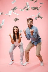 Full length portrait of an excited young couple