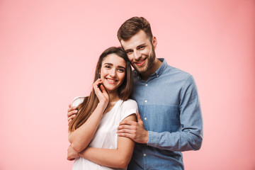 Fototapeta premium Portrait of a beautiful young couple hugging