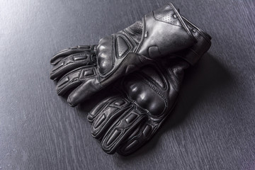  Motorcycle gloves on a gray background