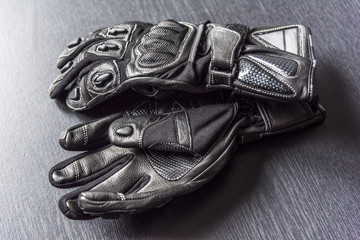  Motorcycle gloves on a gray background